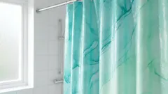 Afscheid genomen van het douchegordijn: een trendy alternatief dat er beter uitziet en langer meegaat